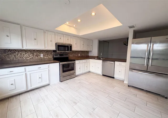 Photo 3 of Condo for sale at 4747 Puritan Cir #523, Tampa, FL 33617 | MLS# O6436743 | Listing updated on 2026-10-01