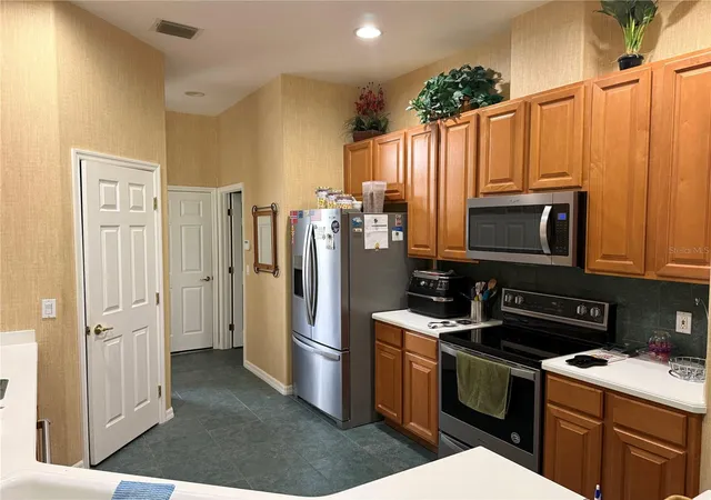 Photo 4 of Single family home for sale at 14444 Dover Forest Dr, Orlando, FL 32828 | MLS# O6436780 | Listing updated on 2026-09-23