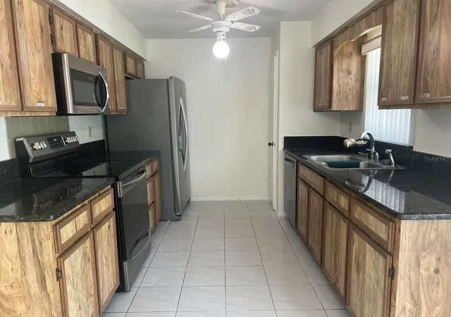 Photo 3 of Single family home for sale at 310 Reid Ct, Sanford, FL 32773 | MLS# O6436812 | Listing updated on 2026-09-19
