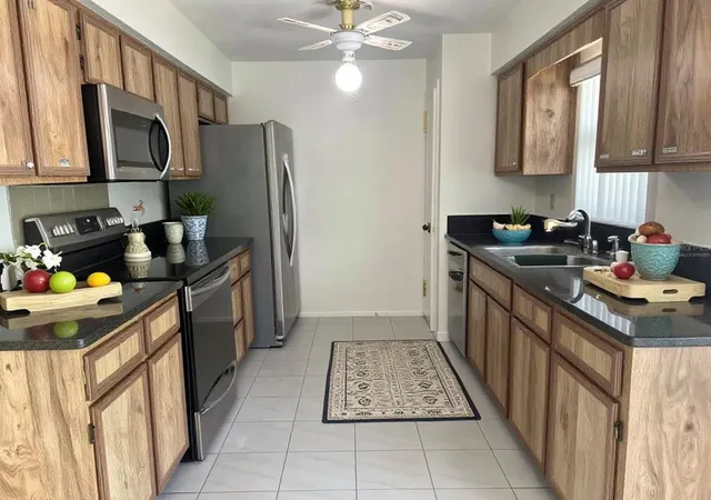 Photo 4 of Single family home for sale at 310 Reid Ct, Sanford, FL 32773 | MLS# O6436812 | Listing updated on 2026-09-19