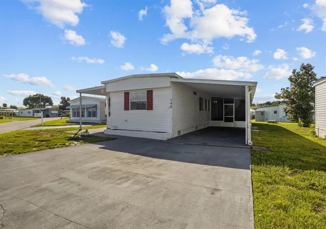 Photo 1 of Manufactured home for sale at 148 Orangewood Dr, Lake Wales, FL 33898 | MLS# S5156375 | Listing updated on 2026-08-28