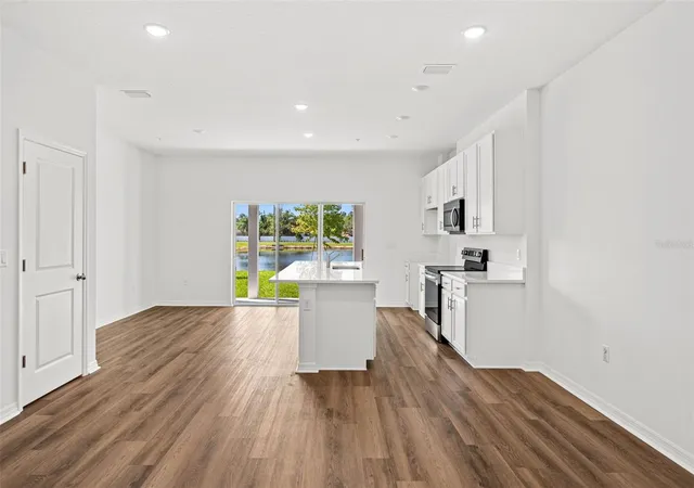 Photo 2 of Townhouse for sale at 4941 Winding River Rd, Orlando, FL 32822 | MLS# W7888937 | Listing updated on 2026-08-27