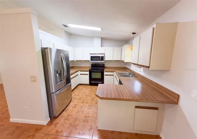 Photo 2 of Single family home for sale at 1008 Lynbrook St Nw, Palm Bay, FL 32907 | MLS# O6436862 | Listing updated on 2026-09-16