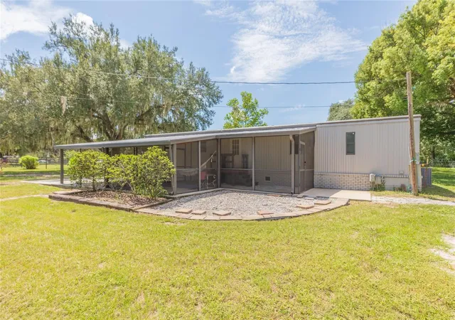Photo 2 of Manufactured home for sale at 4211 Lowell Ln, Zephyrhills, FL 33541 | MLS# TB8542806 | Listing updated on 2026-09-22