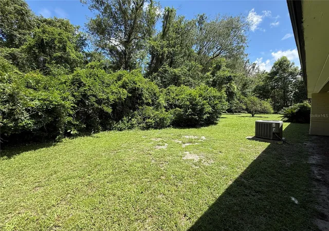 Photo 4 of Single family home for sale at 555 NW 23rd Street, Gainesville, FL 32607 | MLS# TB8542819 | Listing updated on 2026-09-27