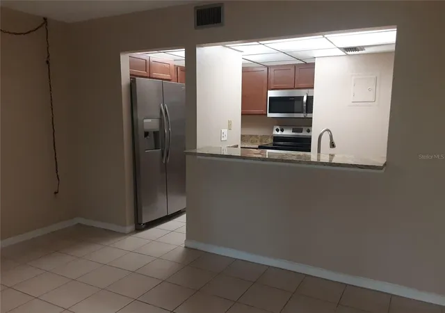 Photo 4 of Condo for sale at 140 Orchid Woods Ct #4C, Deltona, FL 32725 | MLS# R4911890 | Listing updated on 2026-10-01