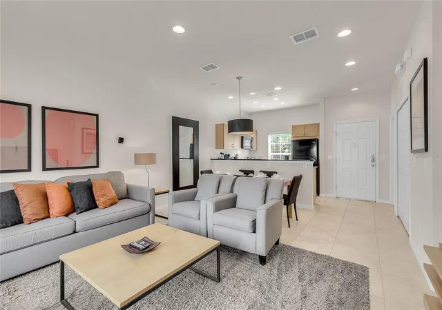 Photo 2 of Townhouse for sale at 3020 Bird Of Paradise Ln, Kissimmee, FL 34747 | MLS# O6436878 | Listing updated on 2026-08-28