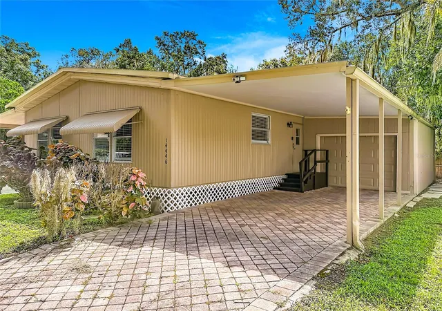 Photo 2 of Manufactured home for sale at 14446 Shangrila Ln, Odessa, FL 33556 | MLS# W7888944 | Listing updated on 2026-10-16