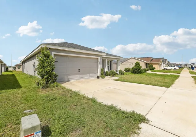 Photo 3 of Single family home for sale at 1042 Corso Dr, Winter Haven, FL 33884 | MLS# TB8542841 | Listing updated on 2026-08-29