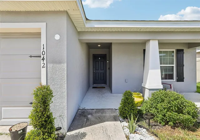 Photo 3 of Single family home for sale at 1042 Corso Dr, Winter Haven, FL 33884 | MLS# TB8542841 | Listing updated on 2026-08-29