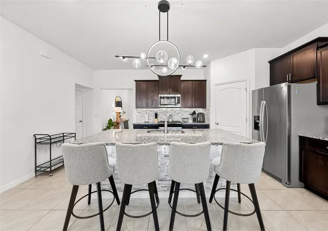 5th image of 7552 Oakmoss Loop, Davenport, FL 33837 | MLS# O6436902