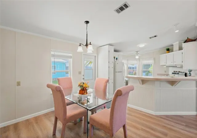Photo 2 of Manufactured home for sale at 693 Riverview Cir, North Port, FL 34287 | MLS# A4704191 | Listing updated on 2026-09-03