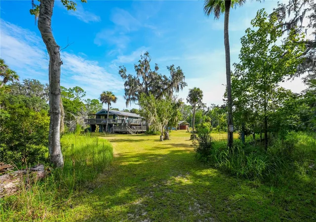Photo 2 of Single family home for sale at 1879 Hideaway Ln, Edgewater, FL 32132 | MLS# O6436933 | Listing updated on 2026-09-03