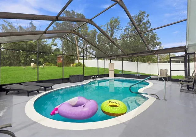 Photo 2 of Single family home for sale at 12411 Brookside St, Spring Hill, FL 34609 | MLS# W7888951 | Listing updated on 2026-08-27
