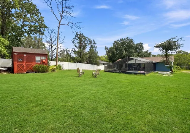 Photo 4 of Single family home for sale at 12411 Brookside St, Spring Hill, FL 34609 | MLS# W7888951 | Listing updated on 2026-08-27