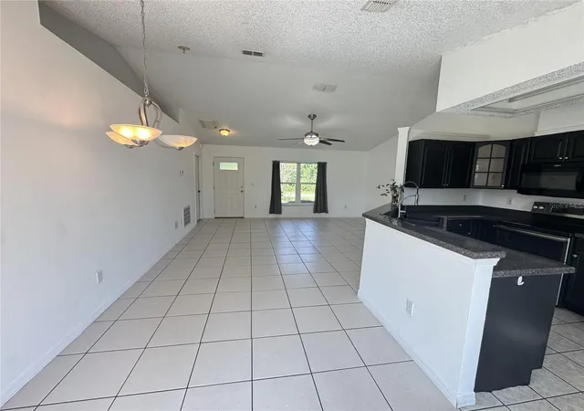Photo 4 of Single family home for sale at 393 Walnut Ave, Orange City, FL 32763 | MLS# V4950936 | Listing updated on 2026-09-24