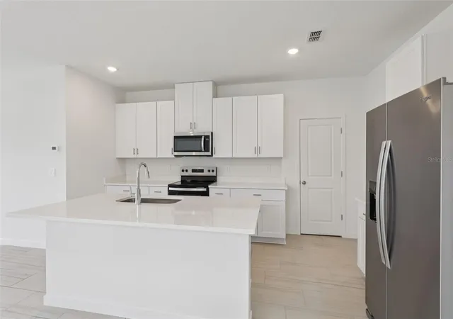 Photo 3 of Single family home for sale at 118 Wandering Crk Way, Palm Coast, FL 32164 | MLS# TB8542953 | Listing updated on 2026-10-05