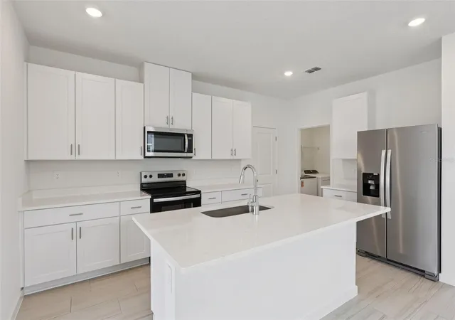 Photo 4 of Single family home for sale at 118 Wandering Crk Way, Palm Coast, FL 32164 | MLS# TB8542953 | Listing updated on 2026-10-05