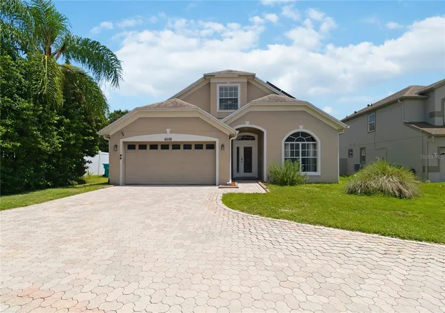 Photo 4 of Single family home for sale at 6658 Lake Pembroke Pl, Orlando, FL 32829 | MLS# O6436979 | Listing updated on 2026-09-12
