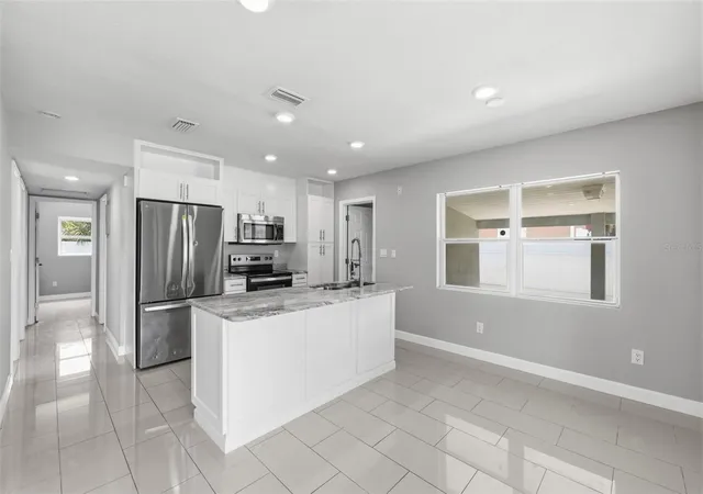 Photo 4 of Single family home for sale at 7806 Tanglewood Ln, Tampa, FL 33615 | MLS# TB8543001 | Listing updated on 2026-10-06