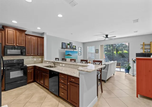 Photo 3 of Townhouse for sale at 8442 Kelsall Dr, Orlando, FL 32832 | MLS# S5156431 | Listing updated on 2026-09-04