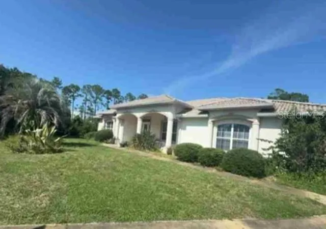 Photo 2 of Single family home for sale at 18 Webelo Pl, Palm Coast, FL 32164 | MLS# O6437027 | Listing updated on 2026-09-29