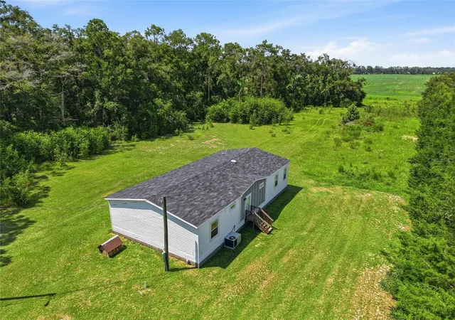 Photo 4 of Manufactured home for sale at 4754 Sw 10Th St, Bell, FL 32619 | MLS# GC543049 | Listing updated on 2026-10-03