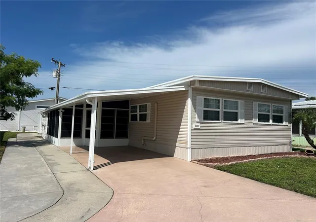 Photo 3 of Manufactured home for sale at 5007 Boca Raton Ave, Sarasota, FL 34234 | MLS# A4704256 | Listing updated on 2026-08-29