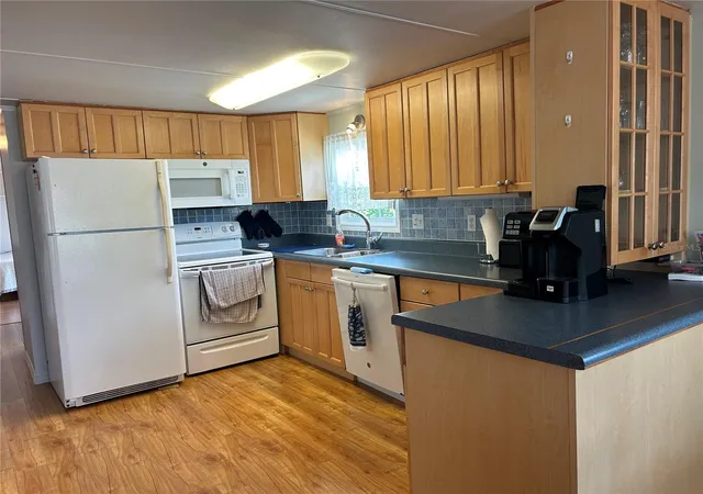 Photo 3 of Manufactured home for sale at 5007 Boca Raton Ave, Sarasota, FL 34234 | MLS# A4704256 | Listing updated on 2026-08-29