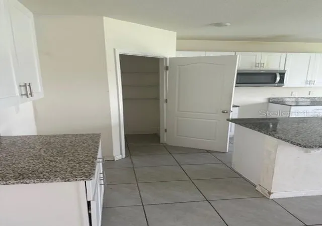 Photo 3 of Single family home for sale at 1550 Oak Reserve Dr, Kissimmee, FL 34744 | MLS# O6437198 | Listing updated on 2026-08-29