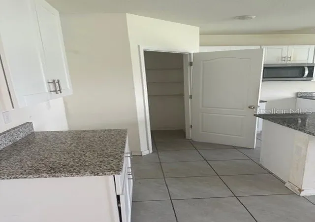 Photo 3 of Single family home for sale at 1550 Oak Reserve Dr, Kissimmee, FL 34744 | MLS# O6437198 | Listing updated on 2026-08-29