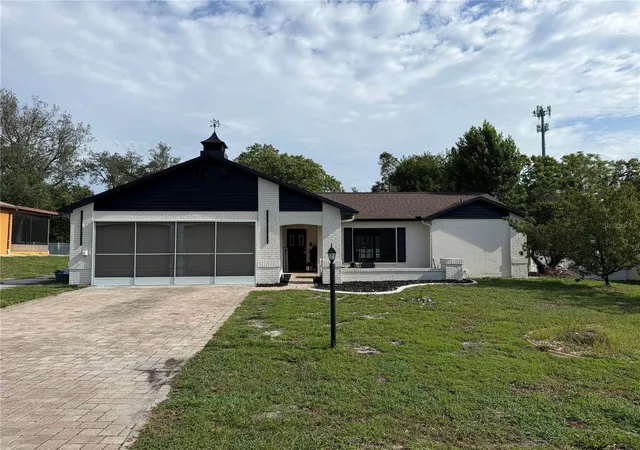 Photo 1 of Single family home for sale at 8185 Philatelic Dr, Spring Hill, FL 34606 | MLS# TB8543239 | Listing updated on 2026-09-01