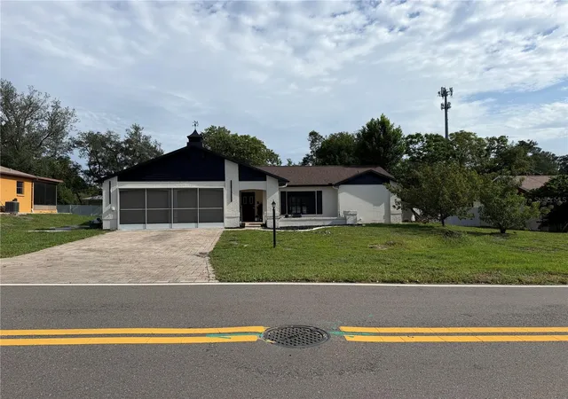 Photo 3 of Single family home for sale at 8185 Philatelic Dr, Spring Hill, FL 34606 | MLS# TB8543239 | Listing updated on 2026-09-01