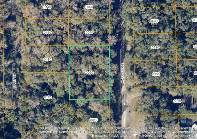 Photo 2 of Land for sale at Tbd Ridgewood Ave, De Leon Springs, FL 32130 | MLS# TB8543257 | Listing updated on 2026-09-23