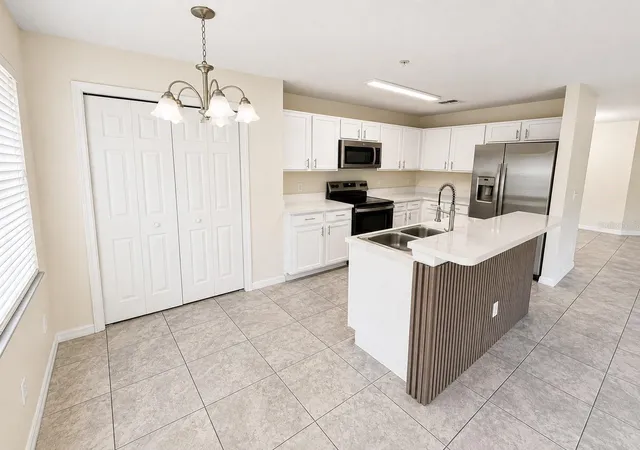 Listing Photo 4 - Condo for sale in building located at 13507 Tea Rose Wy, Orlando, FL 32824 - Unit #128