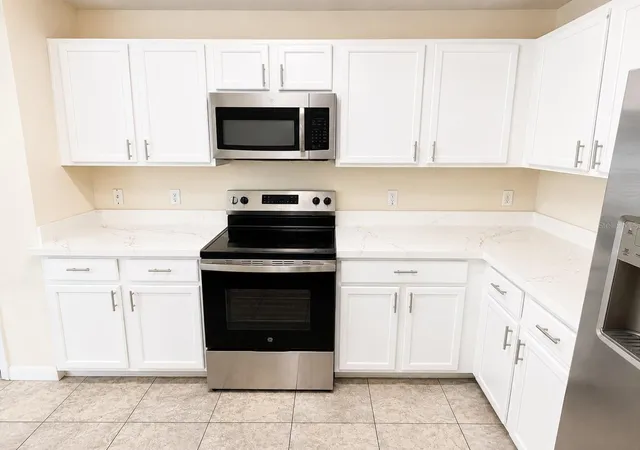Listing Photo 5 - Condo for sale in building located at 13507 Tea Rose Wy, Orlando, FL 32824 - Unit #128