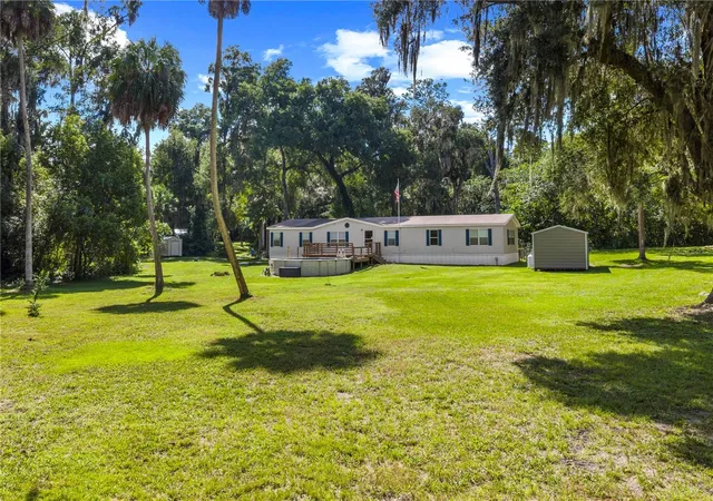 Photo 3 of Manufactured home for sale at 1595 NE 182nd Place, Citra, FL 32113 | MLS# OM731256 | Listing updated on 2026-09-24