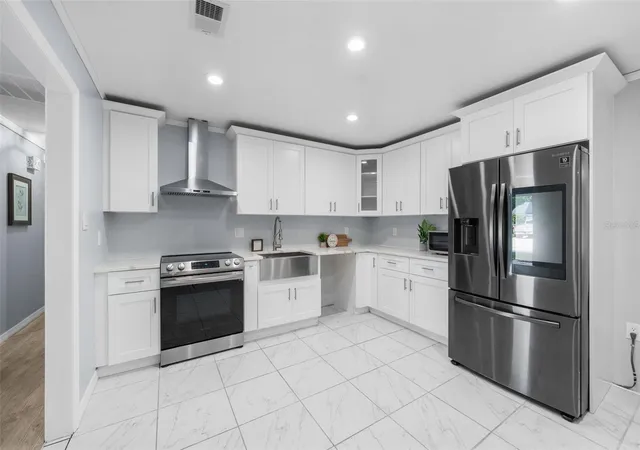 Photo 2 of Single family home for sale at 2827 Nw 42nd Place, Gainesville, FL 32605 | MLS# GC543072 | Listing updated on 2026-10-10