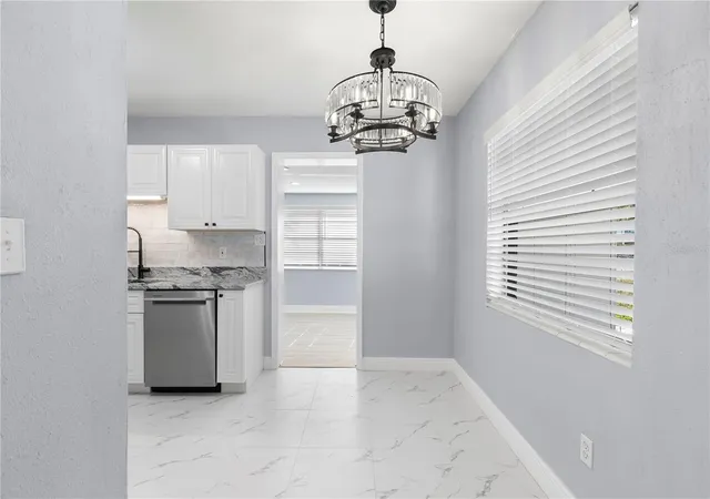 Photo 4 of Single family home for sale at 3921 W Gray St, Tampa, FL 33609 | MLS# TB8543305 | Listing updated on 2026-10-11