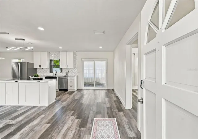 Photo 4 of Single family home for sale at 936 Lyndhurst St, Dunedin, FL 34698 | MLS# TB8543309 | Listing updated on 2026-10-21