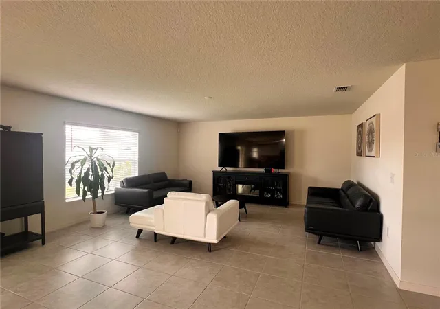 Photo 2 of Single family home for sale at 3209 Eagle Hammock Cir, Kissimmee, FL 34743 | MLS# S5156500 | Listing updated on 2026-09-05