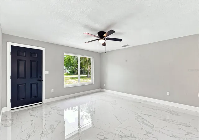 Photo 5 of Single family home for sale at 7033 Wentworth Way, New Port Richey, FL 34655 | MLS# TB8543325 | Listing updated on 2026-09-01
