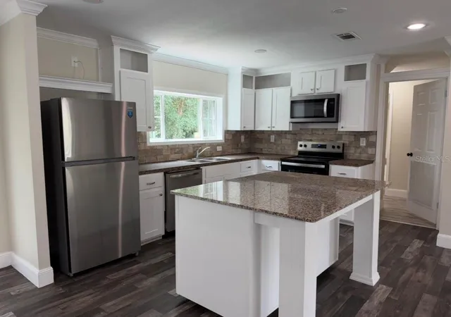 Photo 3 of Manufactured home for sale at 34627 Radio Rd, Leesburg, FL 34788 | MLS# GC543080 | Listing updated on 2026-09-21