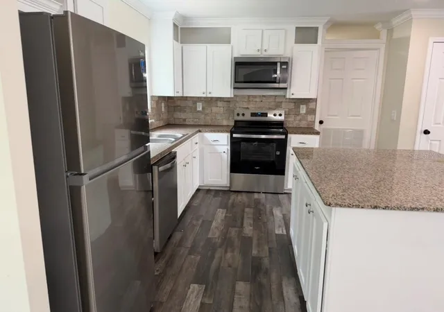 Photo 3 of Manufactured home for sale at 34627 Radio Rd, Leesburg, FL 34788 | MLS# GC543080 | Listing updated on 2026-09-21
