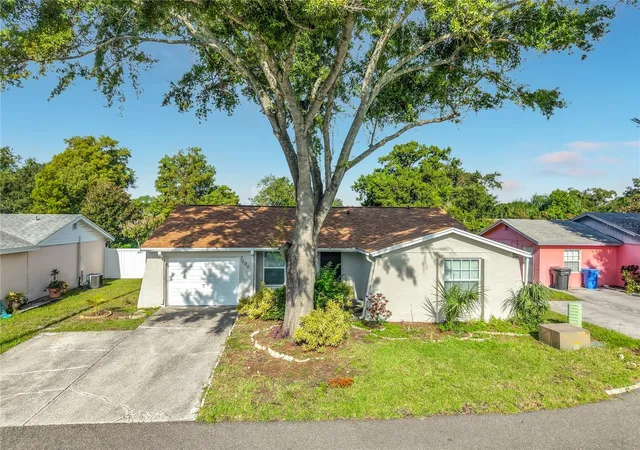 Photo 1 of Single family home for sale at 7606 Woodland Oaks Ct, Tampa, FL 33615 | MLS# TB8543357 | Listing updated on 2026-10-06