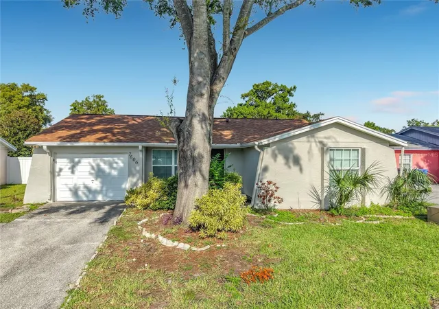 Photo 2 of Single family home for sale at 7606 Woodland Oaks Ct, Tampa, FL 33615 | MLS# TB8543357 | Listing updated on 2026-10-06