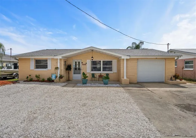 Photo 1 of Single family home for sale at 5410 Flora Ave, Holiday, FL 34690 | MLS# TB8543370 | Listing updated on 2026-10-05