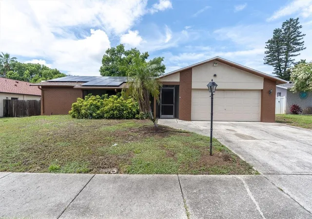 Single family home for sale at 914 Harbor Cir, PALM HARBOR, FL 34683 | MLS# W7889005