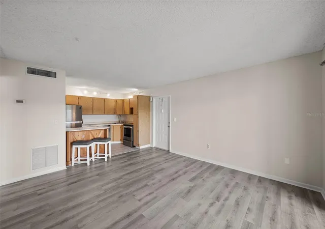 Photo 3 of Condo for sale at 1423 Pine Glen Ln #C1, Tarpon Springs, FL 34688 | MLS# TB8543410 | Listing updated on 2026-09-30