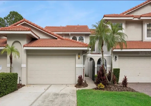 Photo 1 of Townhouse for sale at 8370 Sandpoint Blvd, Orlando, FL 32819 | MLS# O6437427 | Listing updated on 2026-10-06